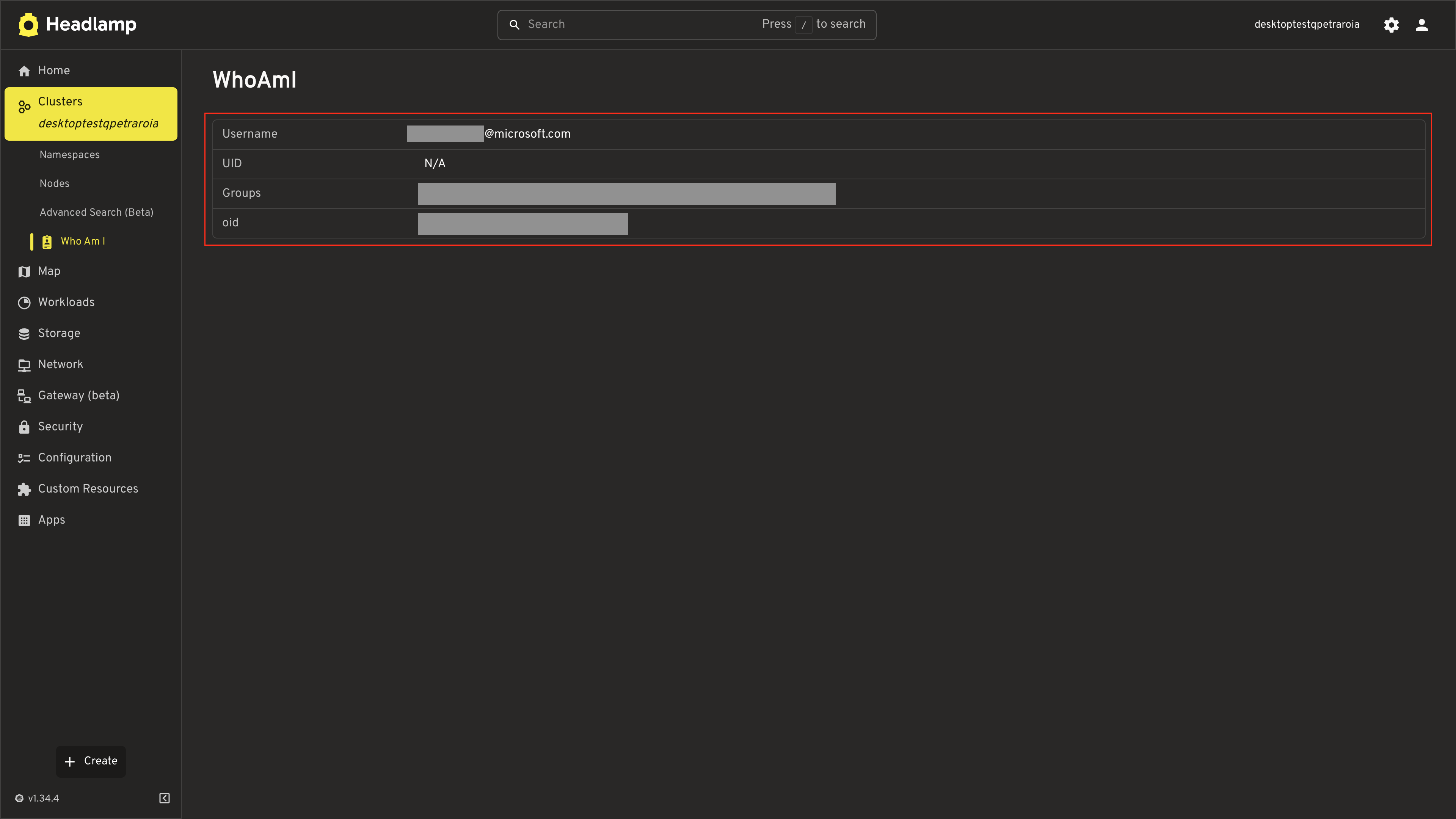 Screenshot of the final WhoAmI page showing the NameValueTable with Username, UID, and Groups displayed as chips